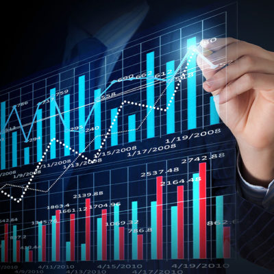 Image: Hand drawing a line on a bar graph