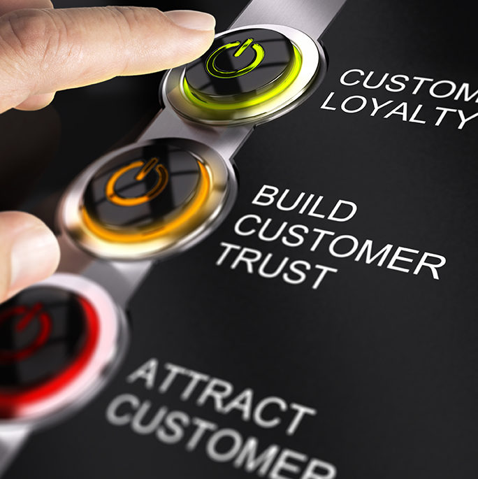 Image: Finger pointing to a 'customer loyalty' button